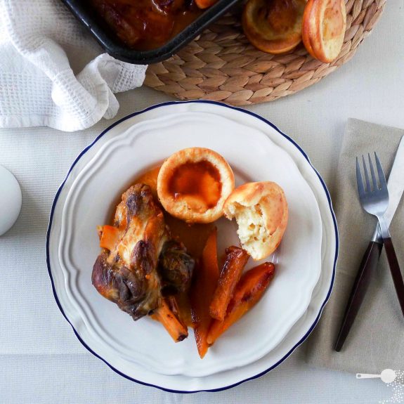 Braised lamb shanks with Yorkshire-style puddings